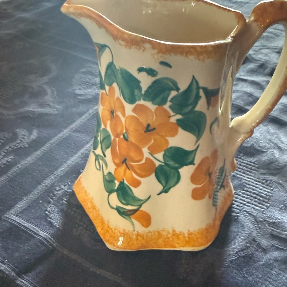 Handcrafted Ceramic Pitcher with Orange Floral Design